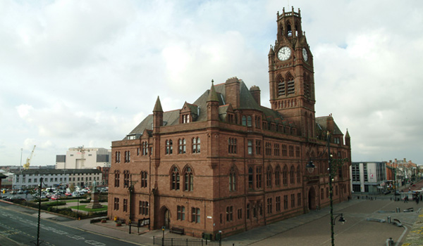 Photo of large building with clock tower