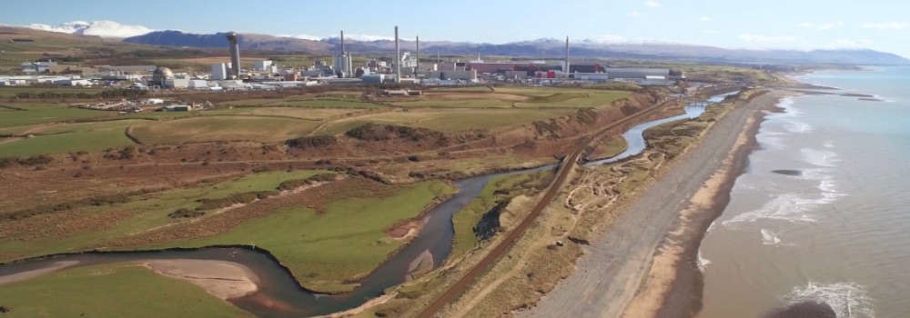 Aerial photograph of nuclear plant alongside coast