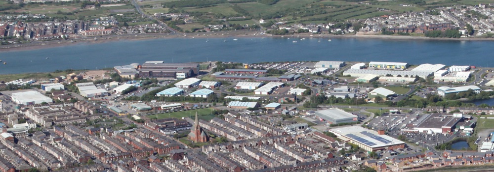 Aerial photograph of Barrow, with housing and river in the distance