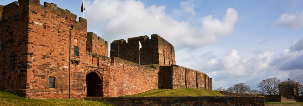 Wide photo of Carlisle Castle and outer moat